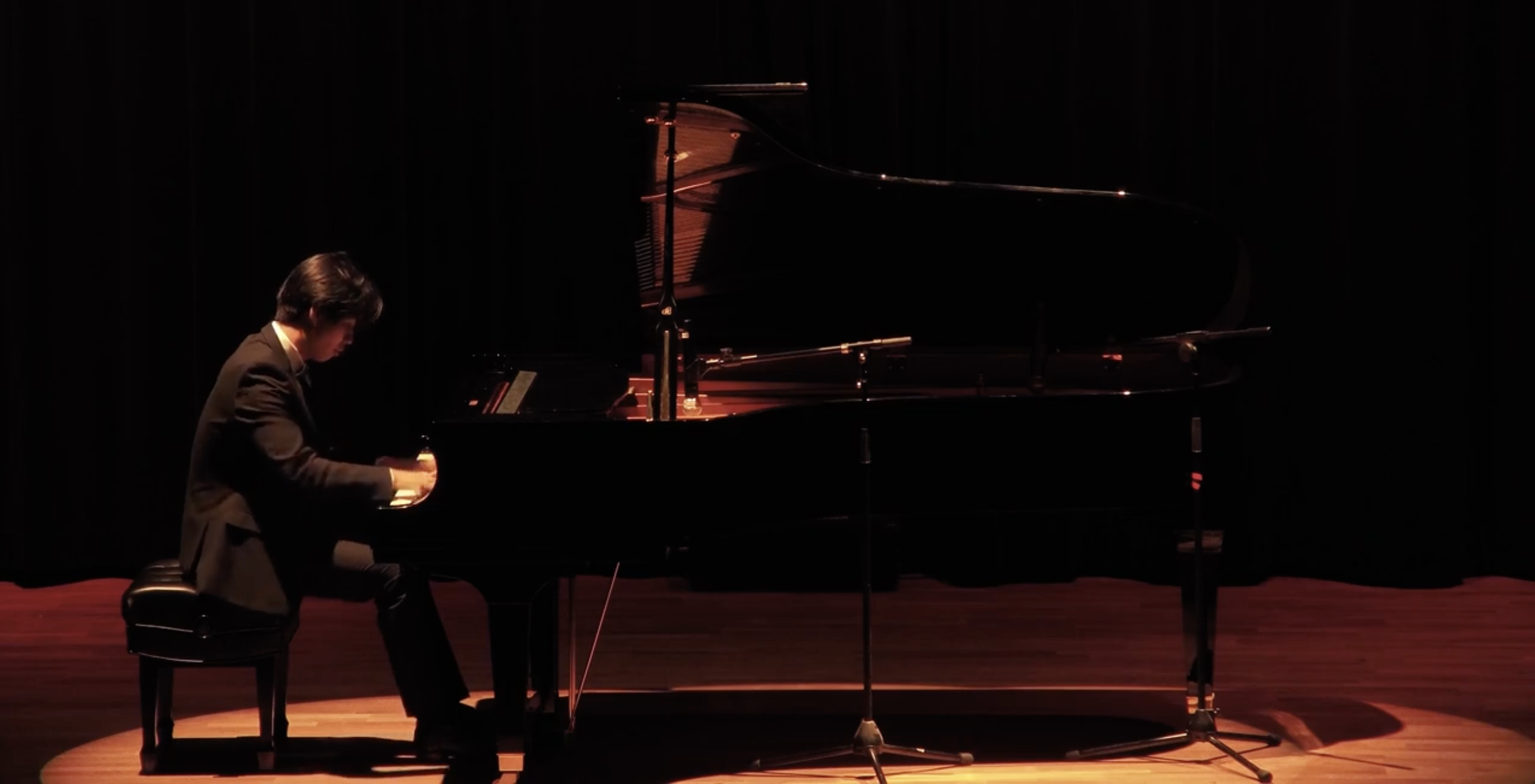 Jan performing at the grand piano during Sunday Supper at International House, UC Berkeley